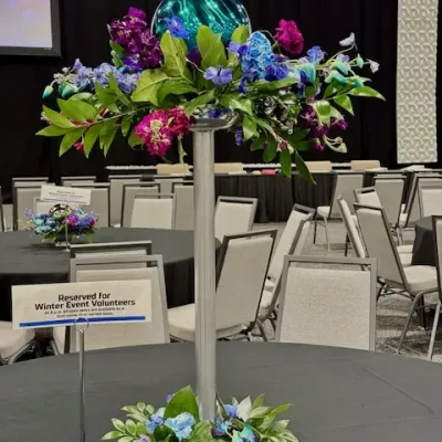 A tall table arrangement at a Garmin buffet.