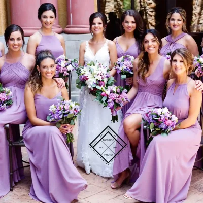 A group of bridesmaids in lavendar.